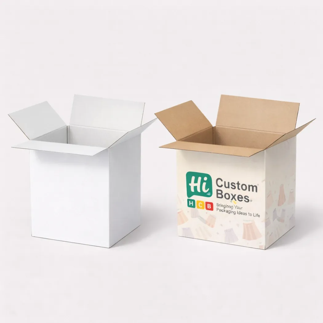 Two open magnetic gift boxes filled with white tissue paper- featuring one plain and one illustrated design- class=
